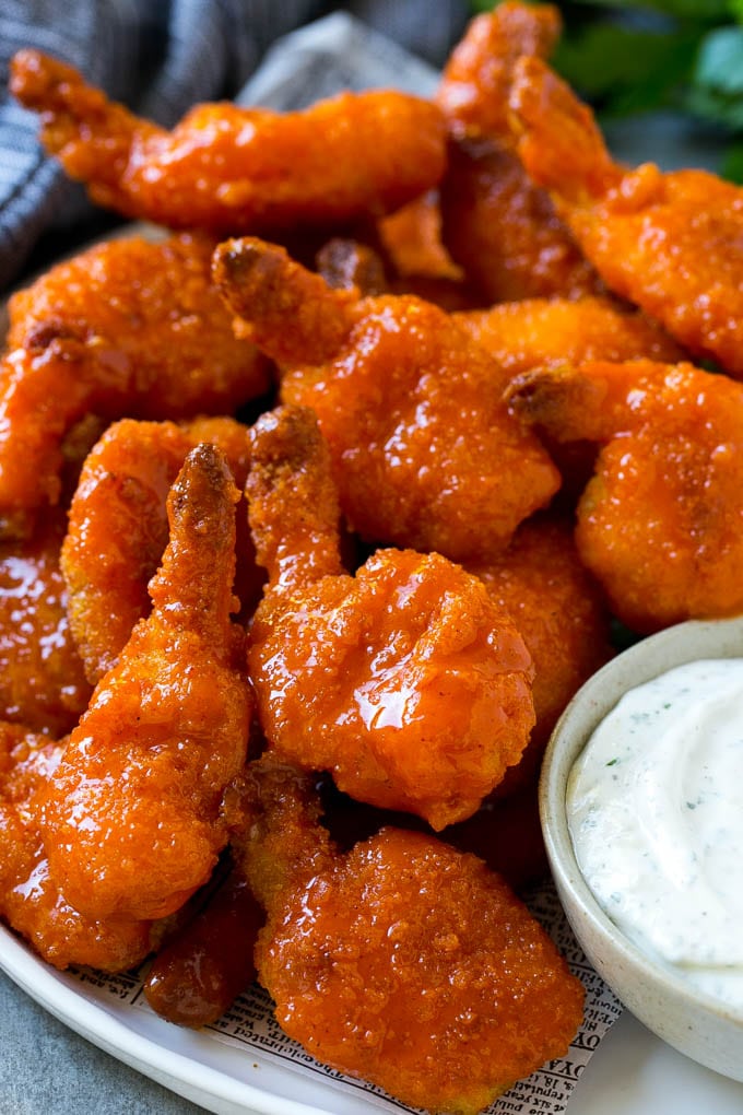 Buffalo Shrimp served with a ranch dipping sauce.