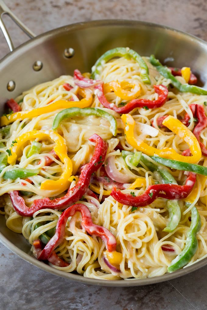 Angel hair pasta and vegetables tossed in a creamy sauce.